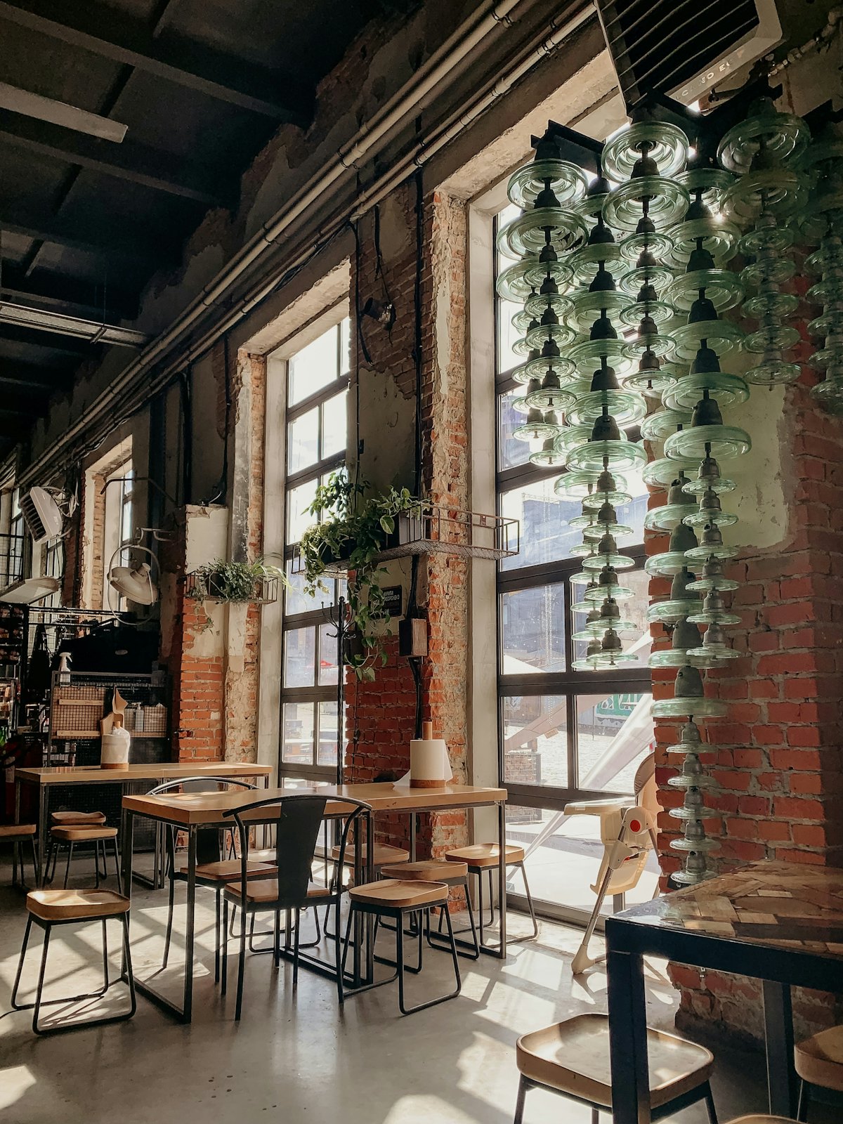 Tables by tall windows