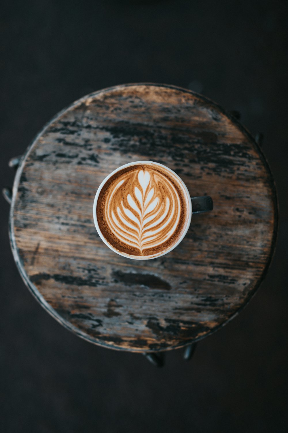 A latte on a wooden table