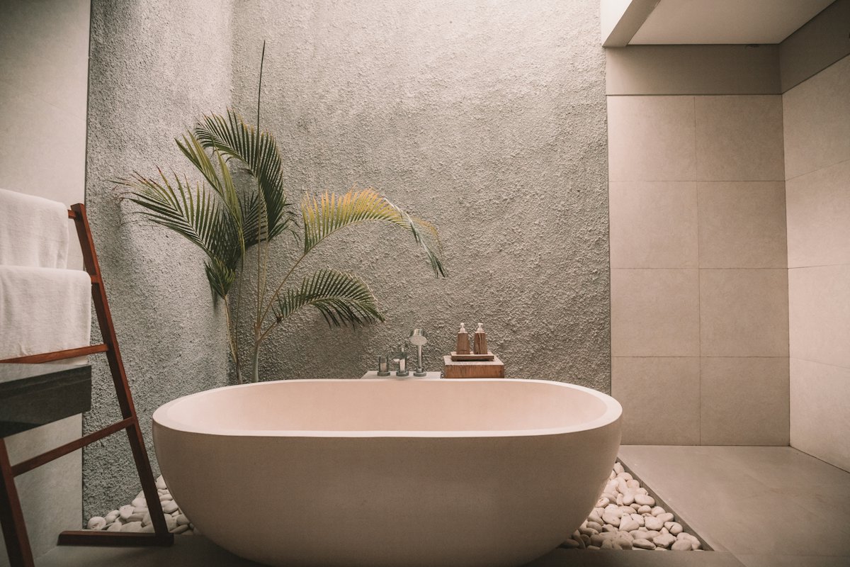 Stone bathroom with freestanding tub