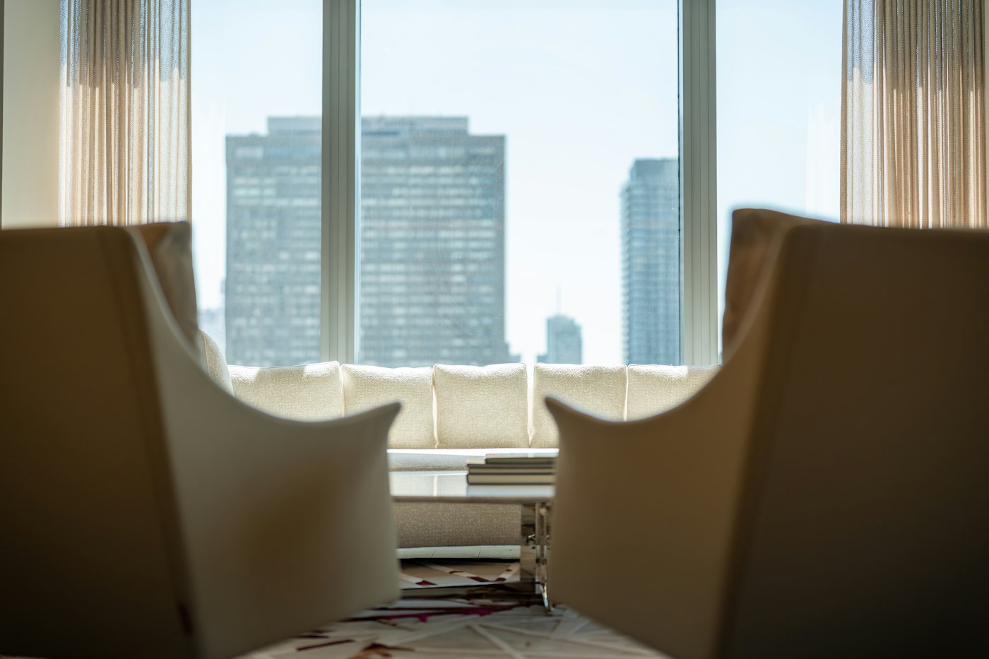 Armchairs facing a city skyline