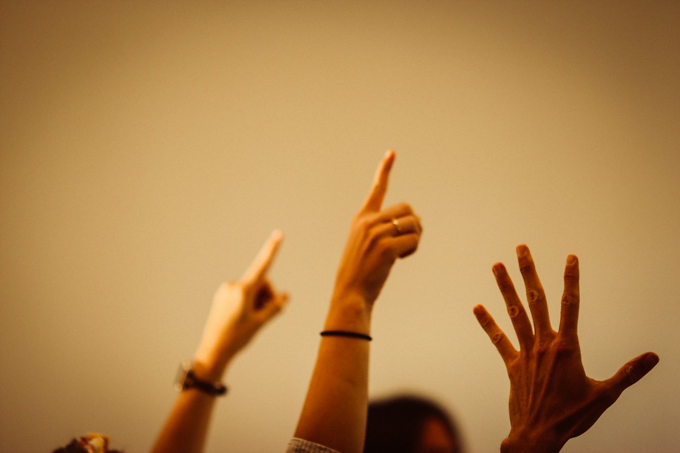 Students raising their hands